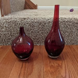 Two red glass vases